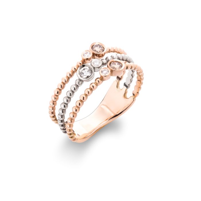 Zlatni prsten sa belim i braon dijamantima