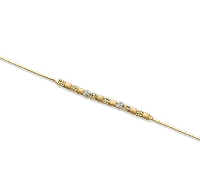 Zlatna narukvica sa graviranim i sjajnim detaljima